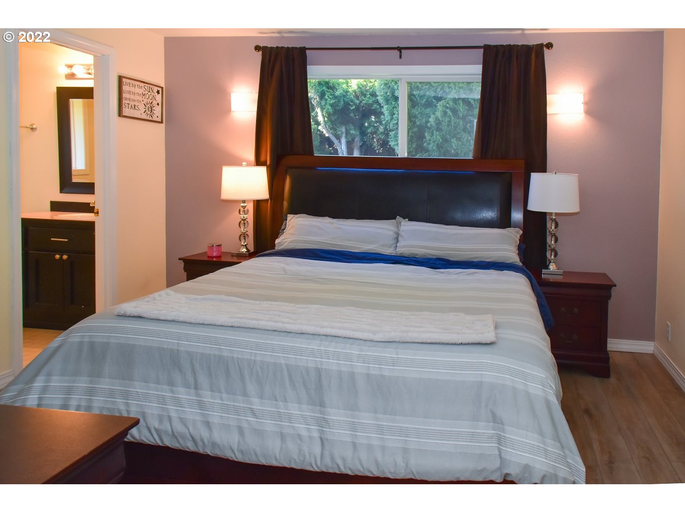 6806 D Court Springfield, OR 97478 - Photo 13 of 22 a bedroom with a bed and a night stand