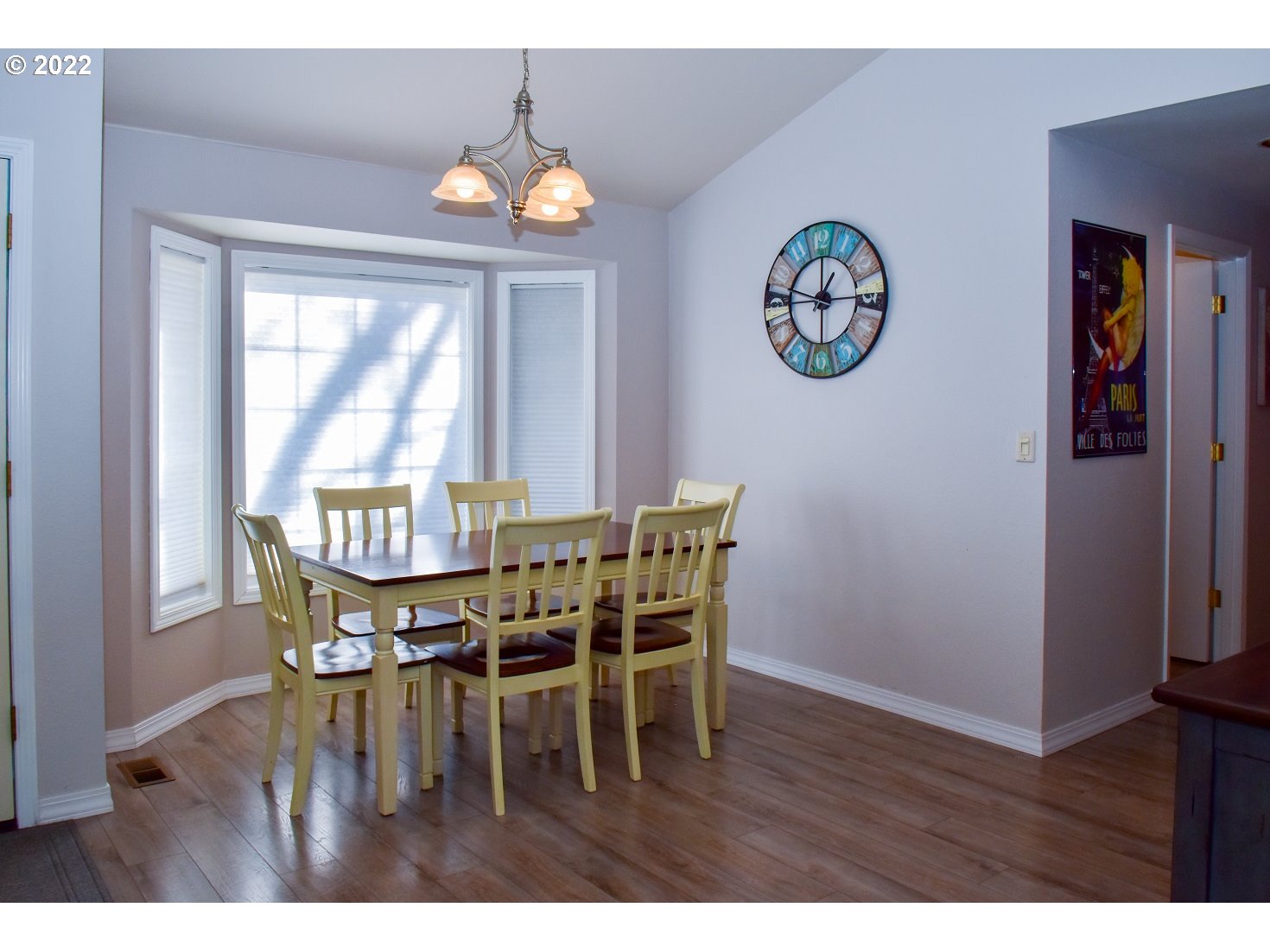 6806 D Court Springfield, OR 97478 - Photo 4 of 22 a view of a dining room with furniture window and wooden floor