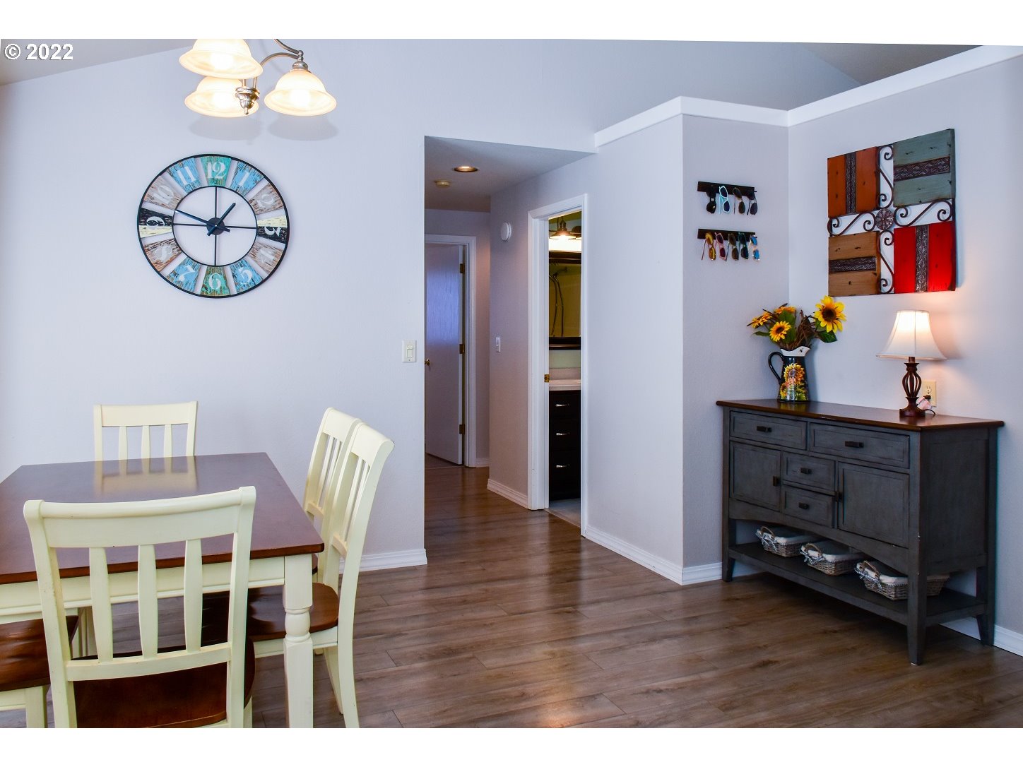 6806 D Court Springfield, OR 97478 - Photo 5 of 22 a view of a dining room with furniture and wooden floor
