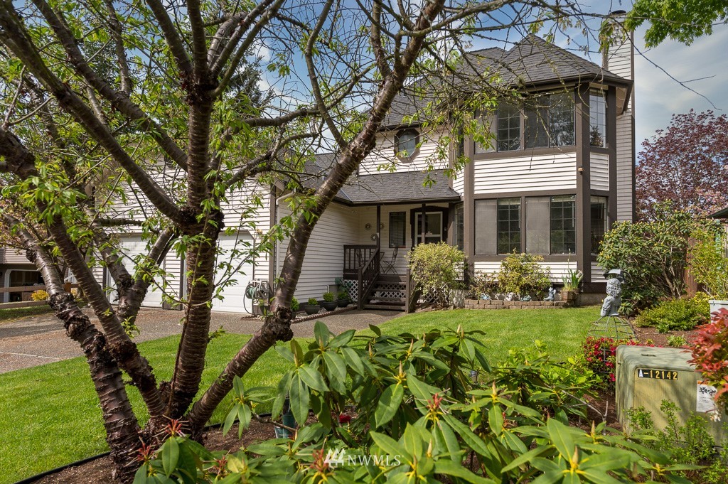 23110 13th Place West Bothell, WA 98021 - Photo 1 of 30 a view of a house with backyard