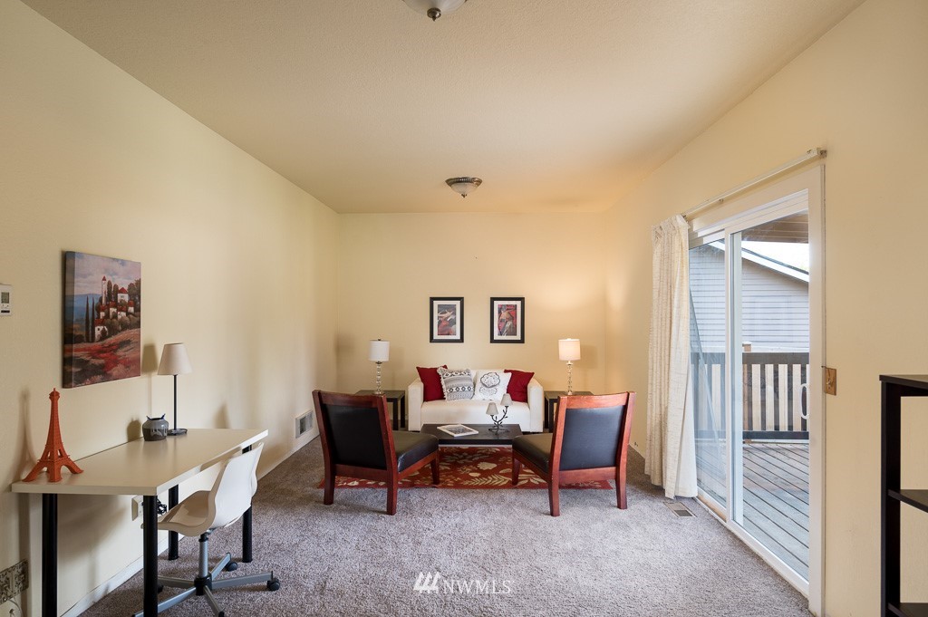 23110 13th Place West Bothell, WA 98021 - Photo 14 of 30 a living room with furniture and a window