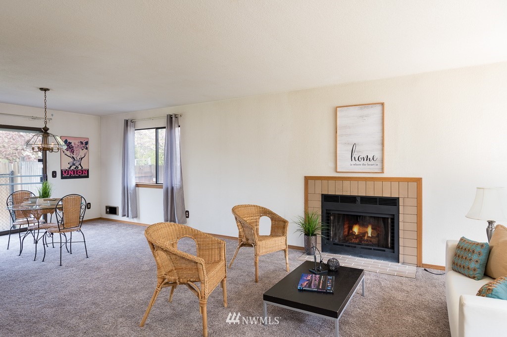 23110 13th Place West Bothell, WA 98021 - Photo 5 of 30 a living room with furniture and a fireplace