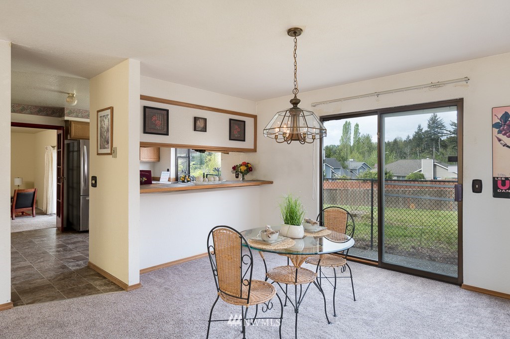 23110 13th Place West Bothell, WA 98021 - Photo 7 of 30 a view of a dining room with furniture window and outside view