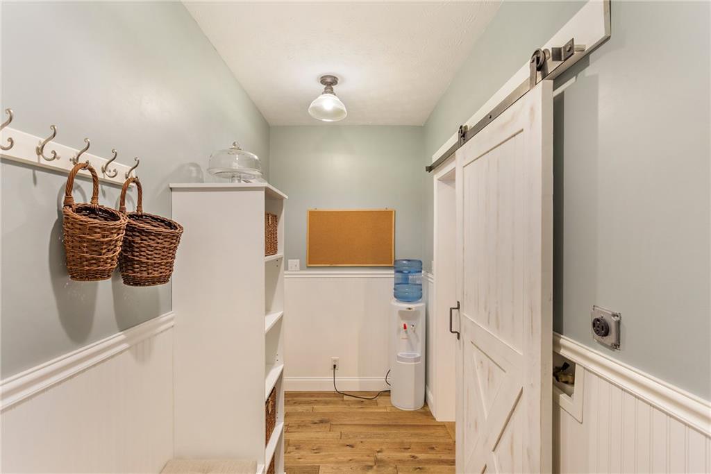 375 Lynn Portal Road Washington, PA 15301 - Photo 17 of 25 Mud room with 1st floor laundry option (hookups available), charming solid wood barn door & access to the attached garage