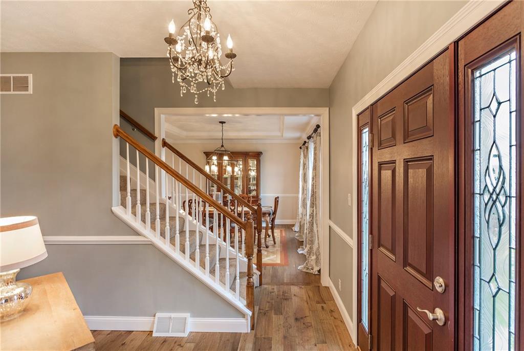 375 Lynn Portal Road Washington, PA 15301 - Photo 10 of 25 Impressive Foyer! Quality hickory random plank, hand-scraped hardwood floor on the entire 1st floor & master bedroom