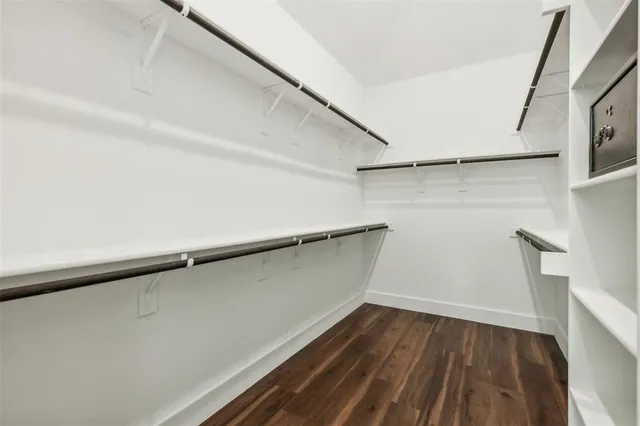 a view of an empty walk in closet