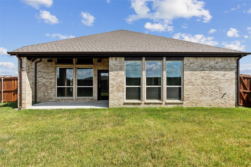 2540 Baypoint Drive Grand Prairie, TX 75054 - Photo 30 of 34 a view of a house with a garden