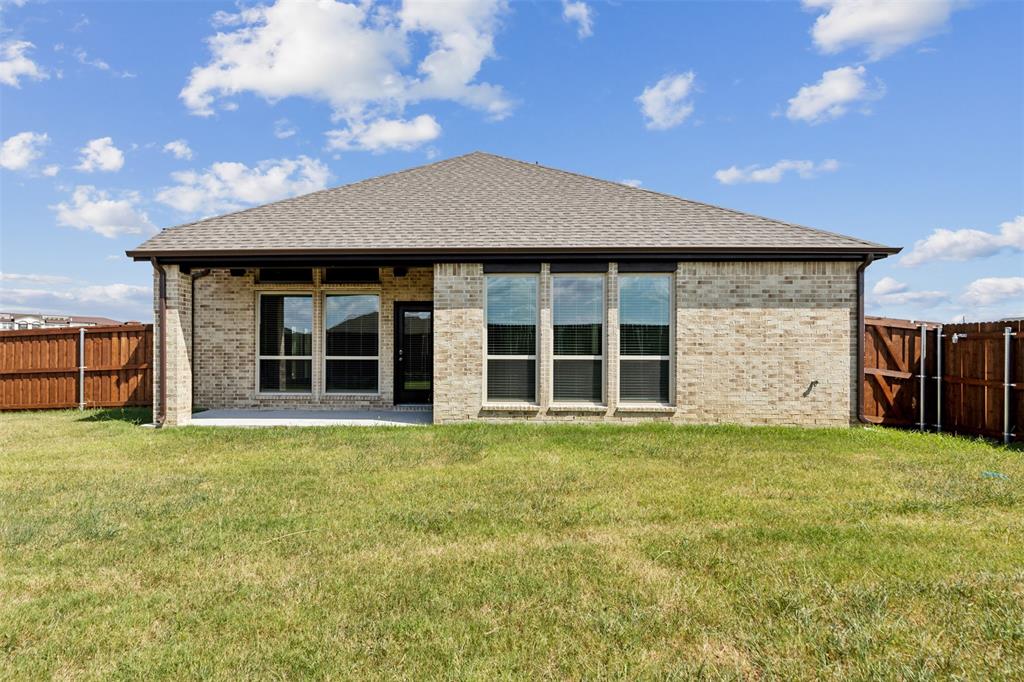 2540 Baypoint Drive Grand Prairie, TX 75054 - Photo 33 of 34 a view of a house with yard and porch