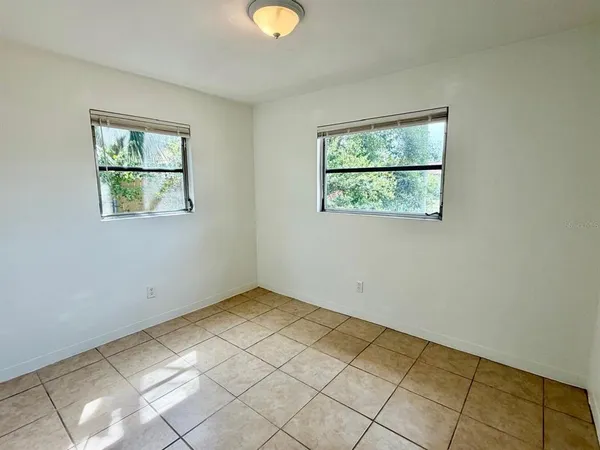 a view of a livingroom with wooden floor