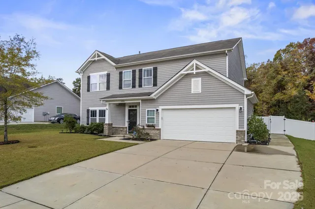 a front view of house with yard
