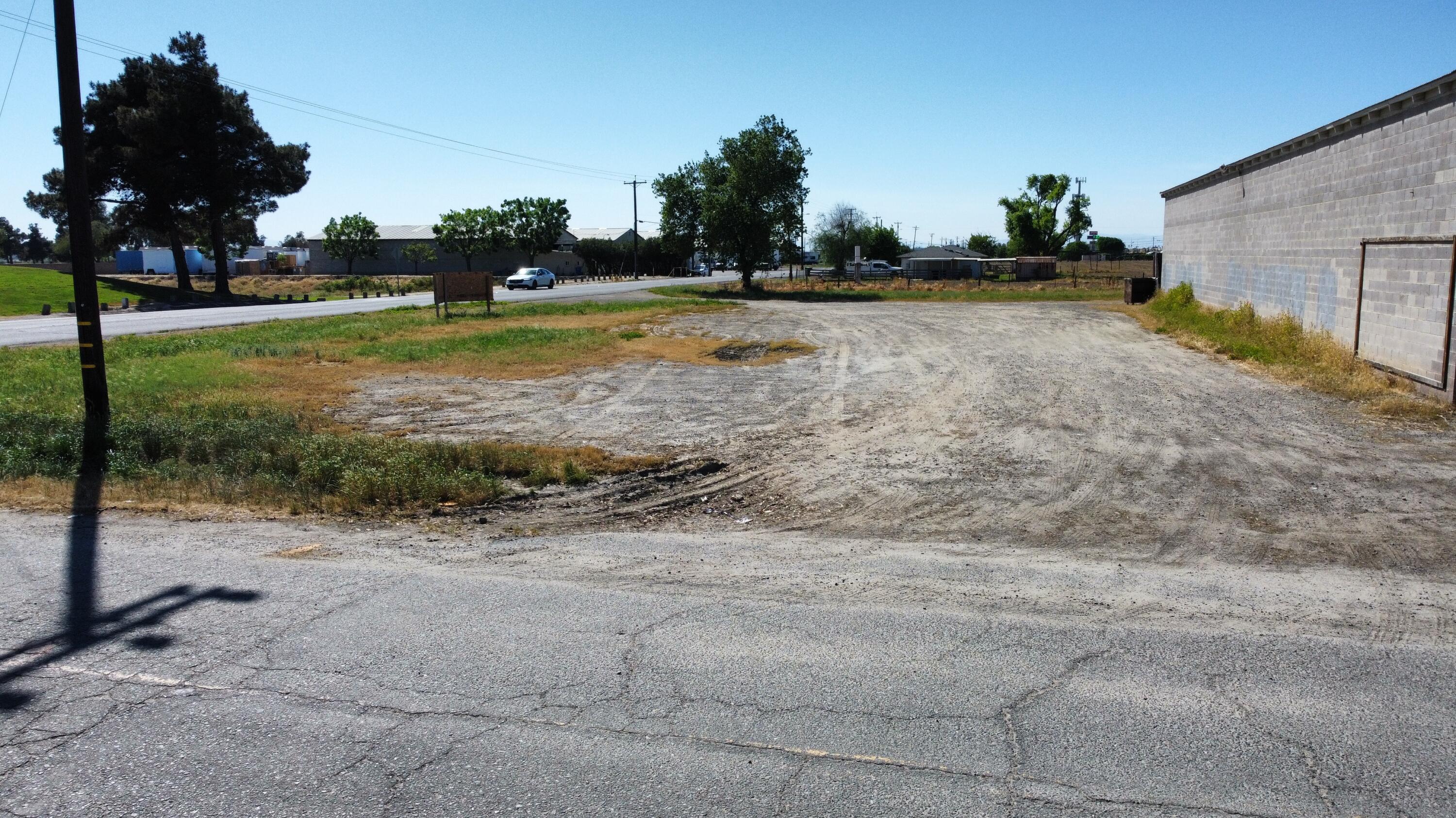 898 Champion Street Lemoore, CA 93245 - Photo 5 of 5 a view of a lake with a big yard
