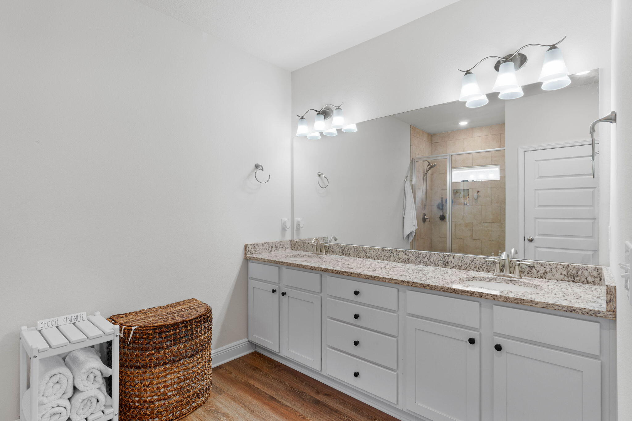 371 Lightning Bug Lane Freeport, FL 32439 - Photo 23 of 56 a bathroom with a sink double vanity and a mirror