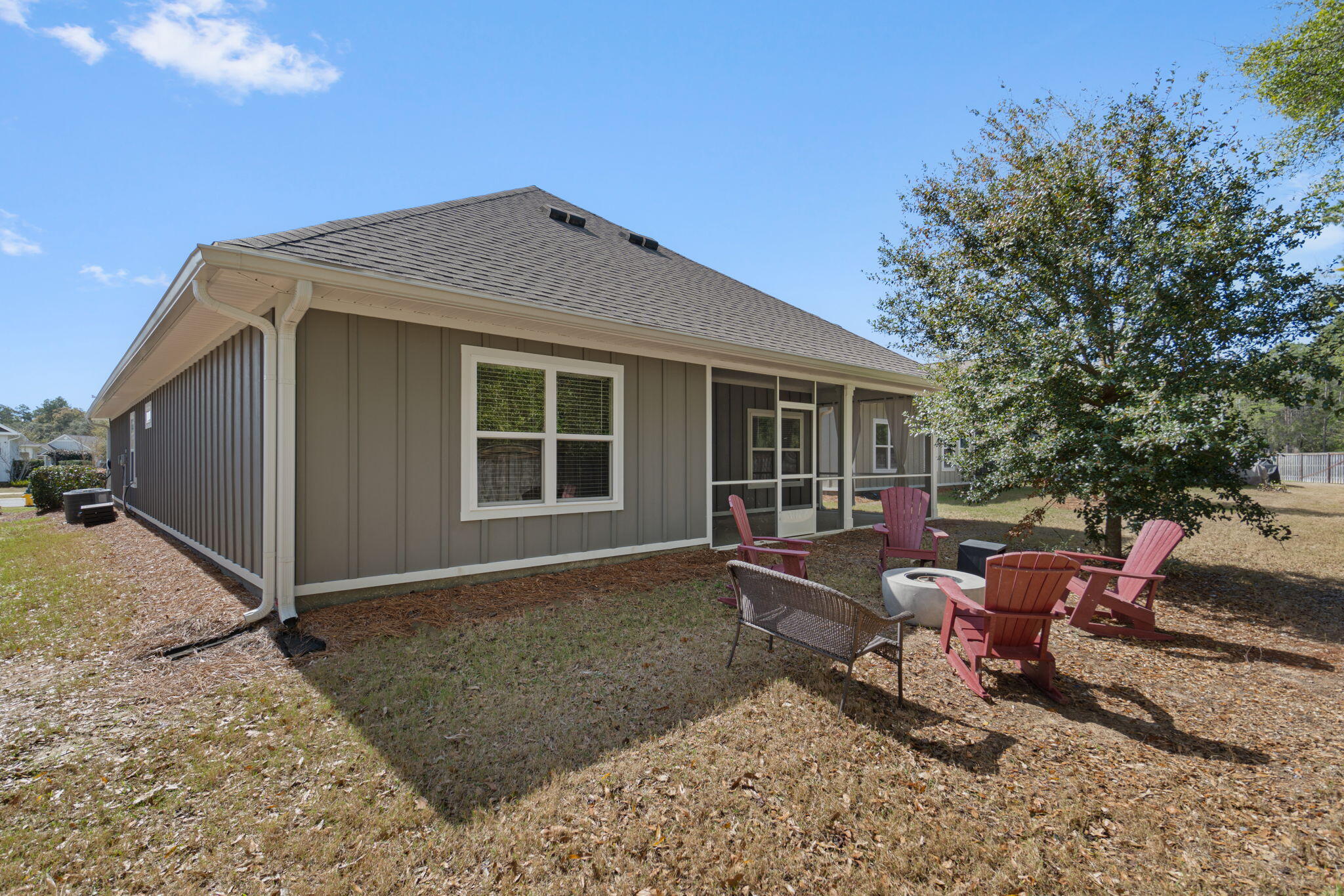 371 Lightning Bug Lane Freeport, FL 32439 - Photo 29 of 56 a view of a house with backyard and sitting area