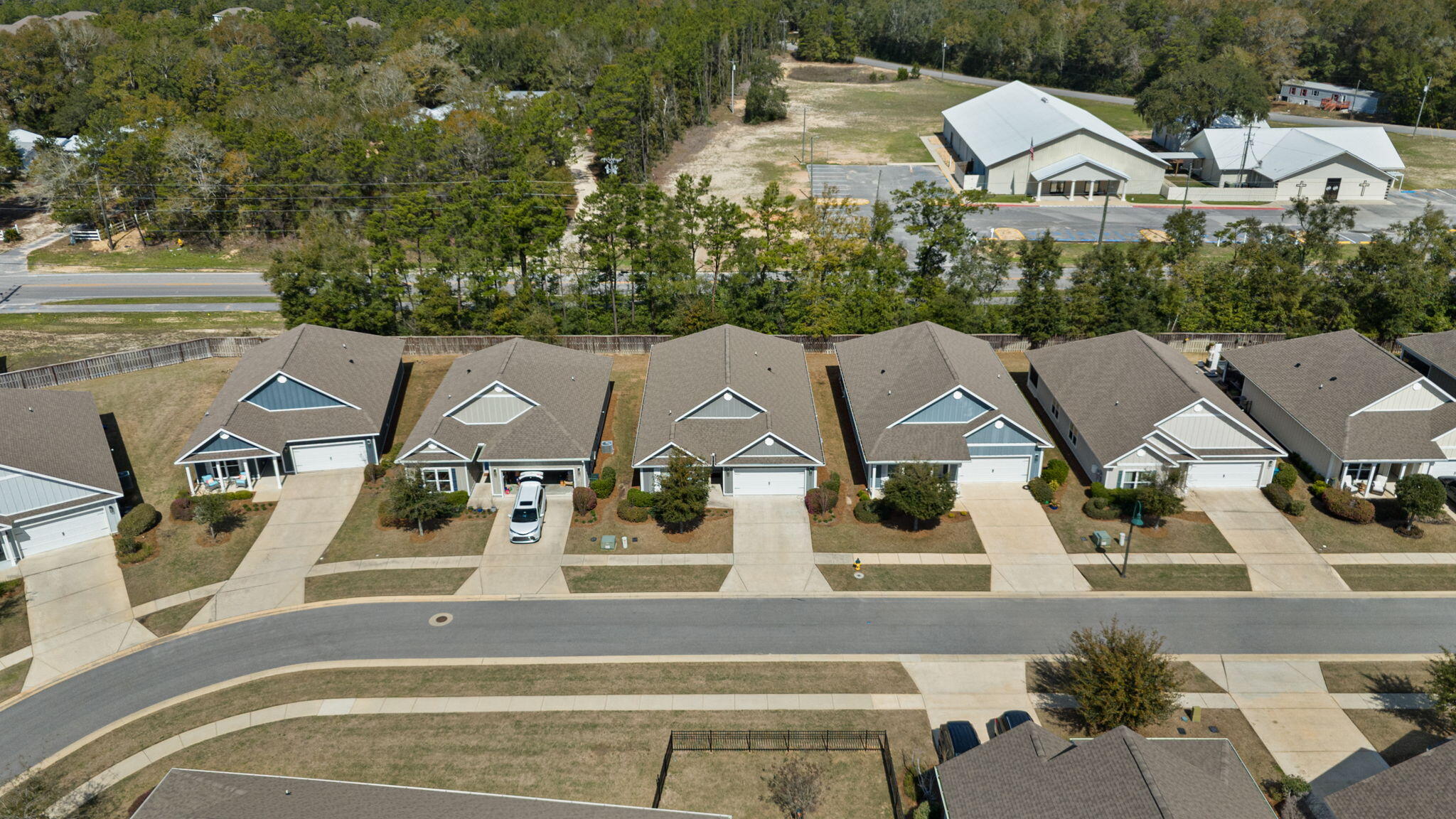 371 Lightning Bug Lane Freeport, FL 32439 - Photo 47 of 56 an aerial view of a house with garden space and street view
