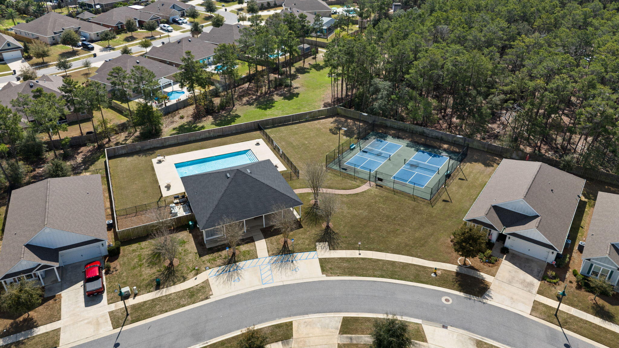 371 Lightning Bug Lane Freeport, FL 32439 - Photo 56 of 56 an aerial view of a house with a swimming pool