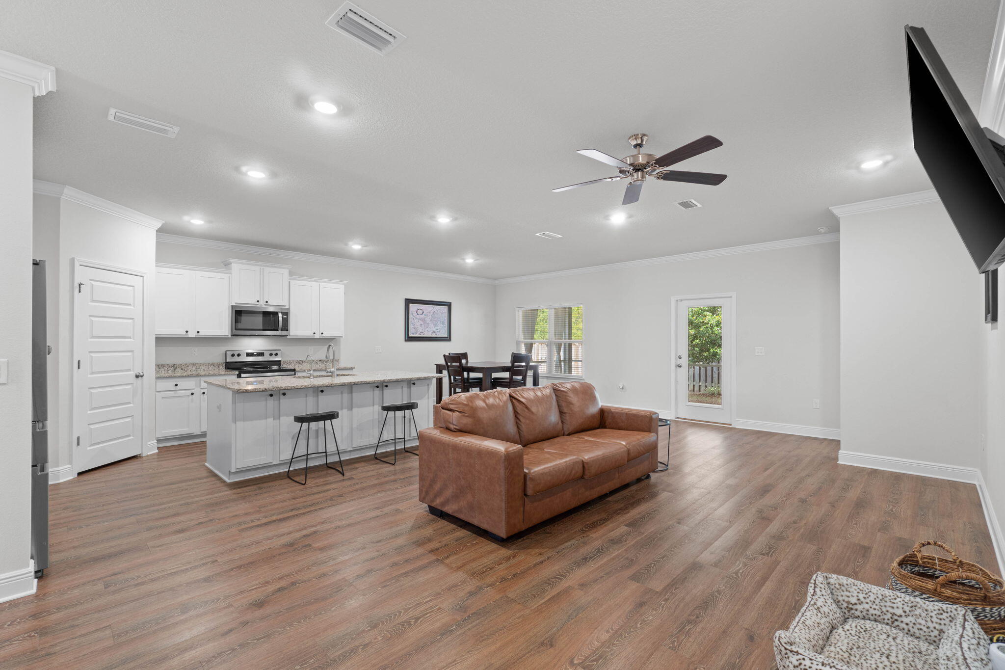 371 Lightning Bug Lane Freeport, FL 32439 - Photo 6 of 56 a living room with furniture and kitchen view