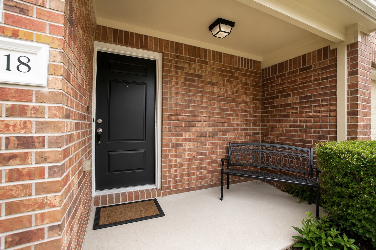 1618 Grable Cove Lane Spring, TX 77379 - Photo 3 of 32 Before stepping inside, enjoy a charming covered entry patio that adds warmth, character, and a cozy place to unwind.