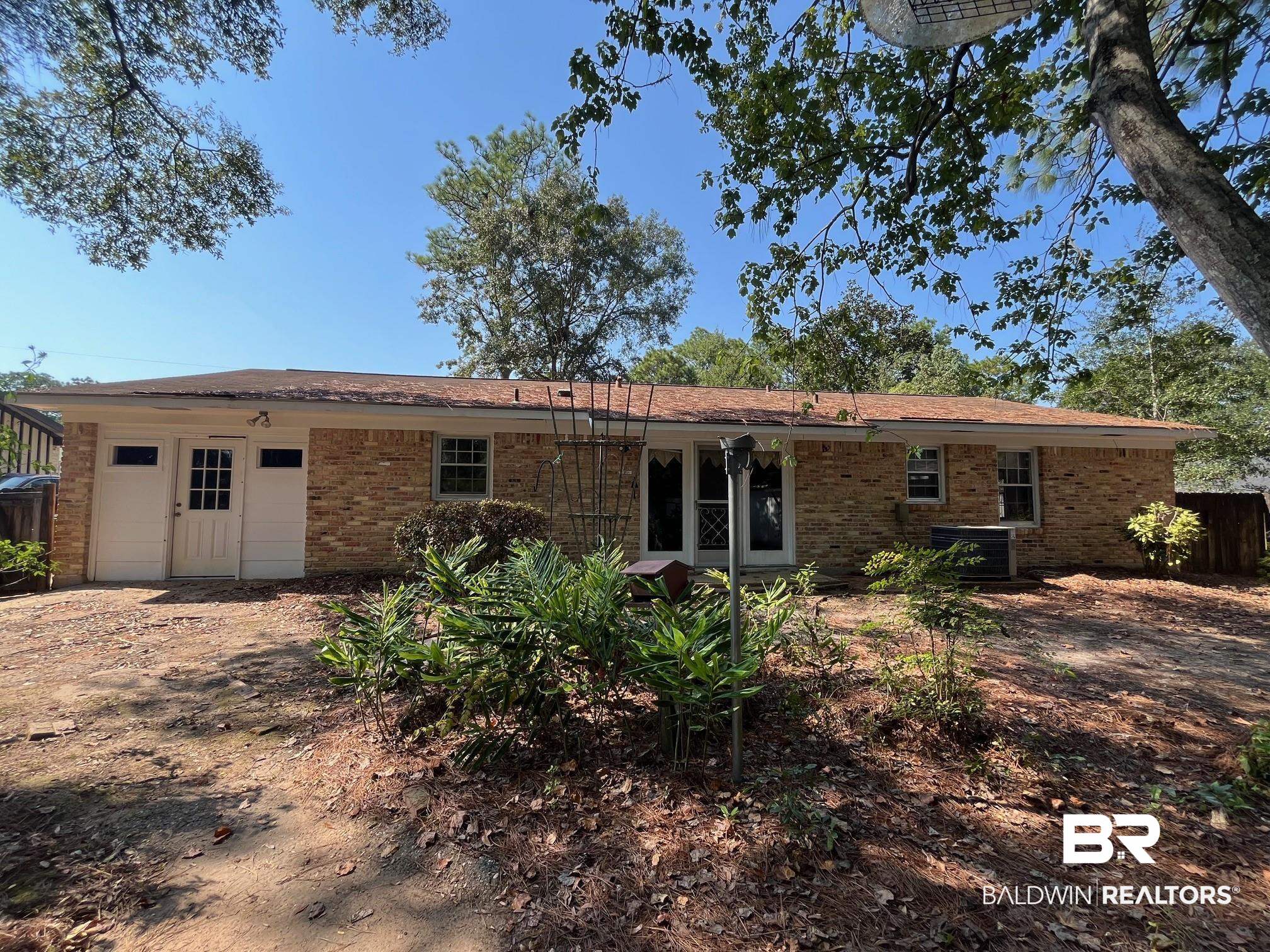 816 Overbey Drive Mobile, AL 36608 - Photo 5 of 27 Rear view of property featuring central air condition unit
