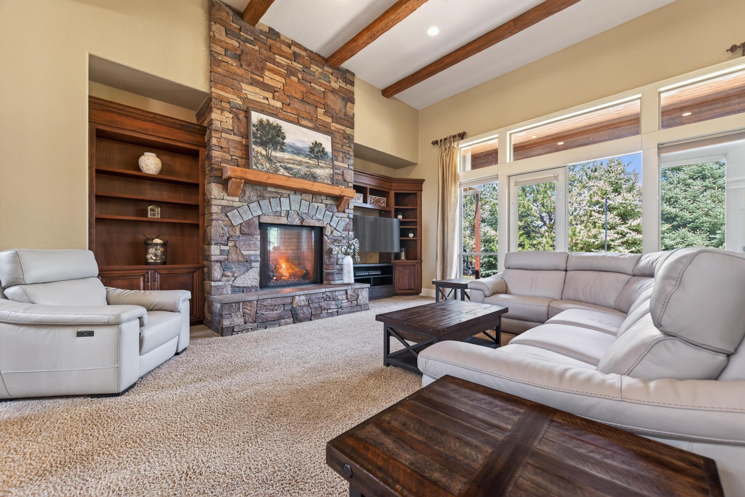 9009 Merlin Drive Redmond, OR 97756 - Photo 11 of 98 a living room with furniture and a large window