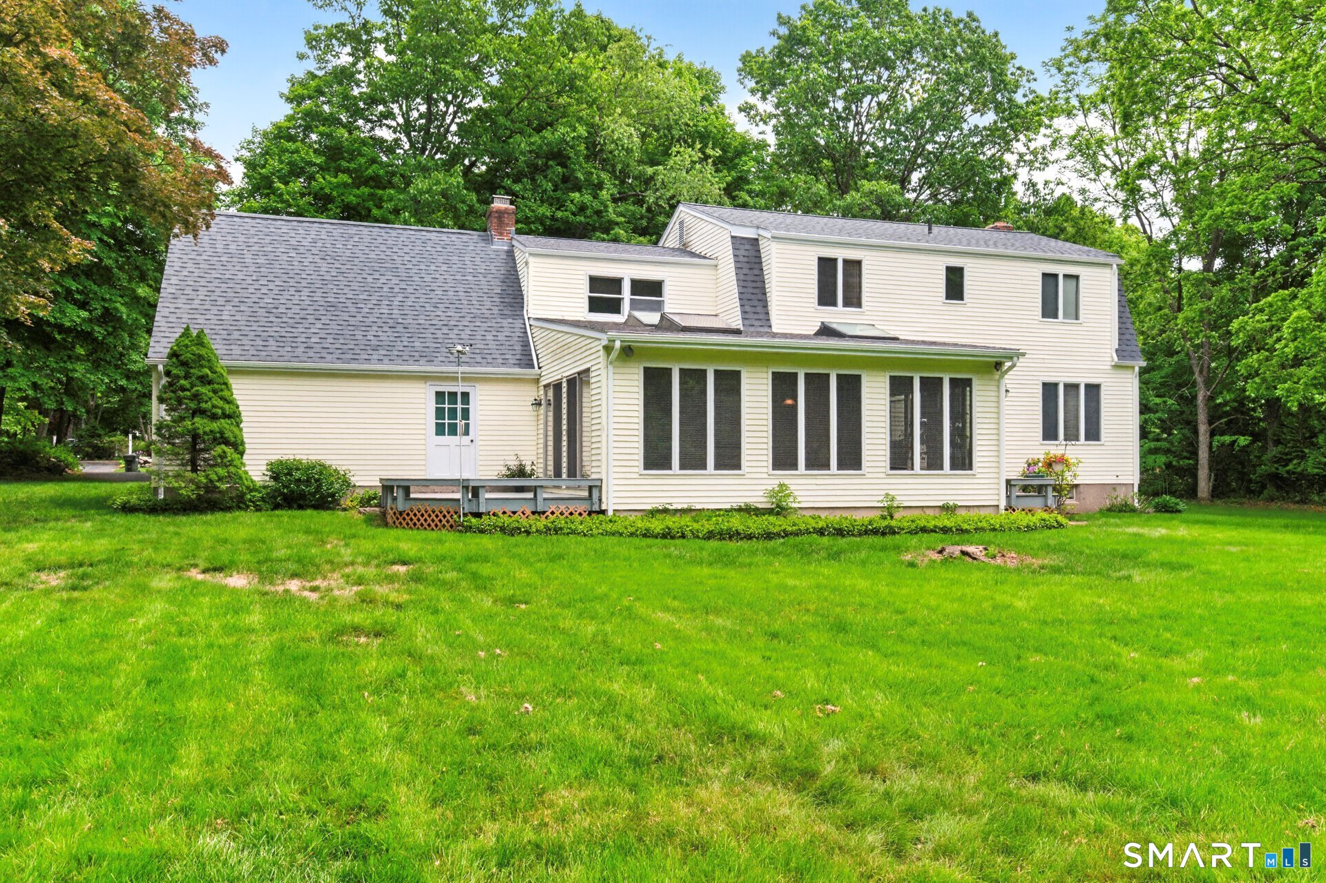 5 Shingle Mill Drive Canton, CT 06019 - Photo 38 of 38 a front view of a house with a garden