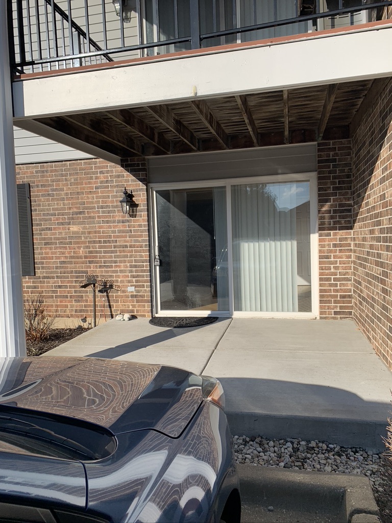 929 Golf Course Road, Unit 1 Crystal Lake, IL 60014 - Photo 2 of 2 a view of house with backyard