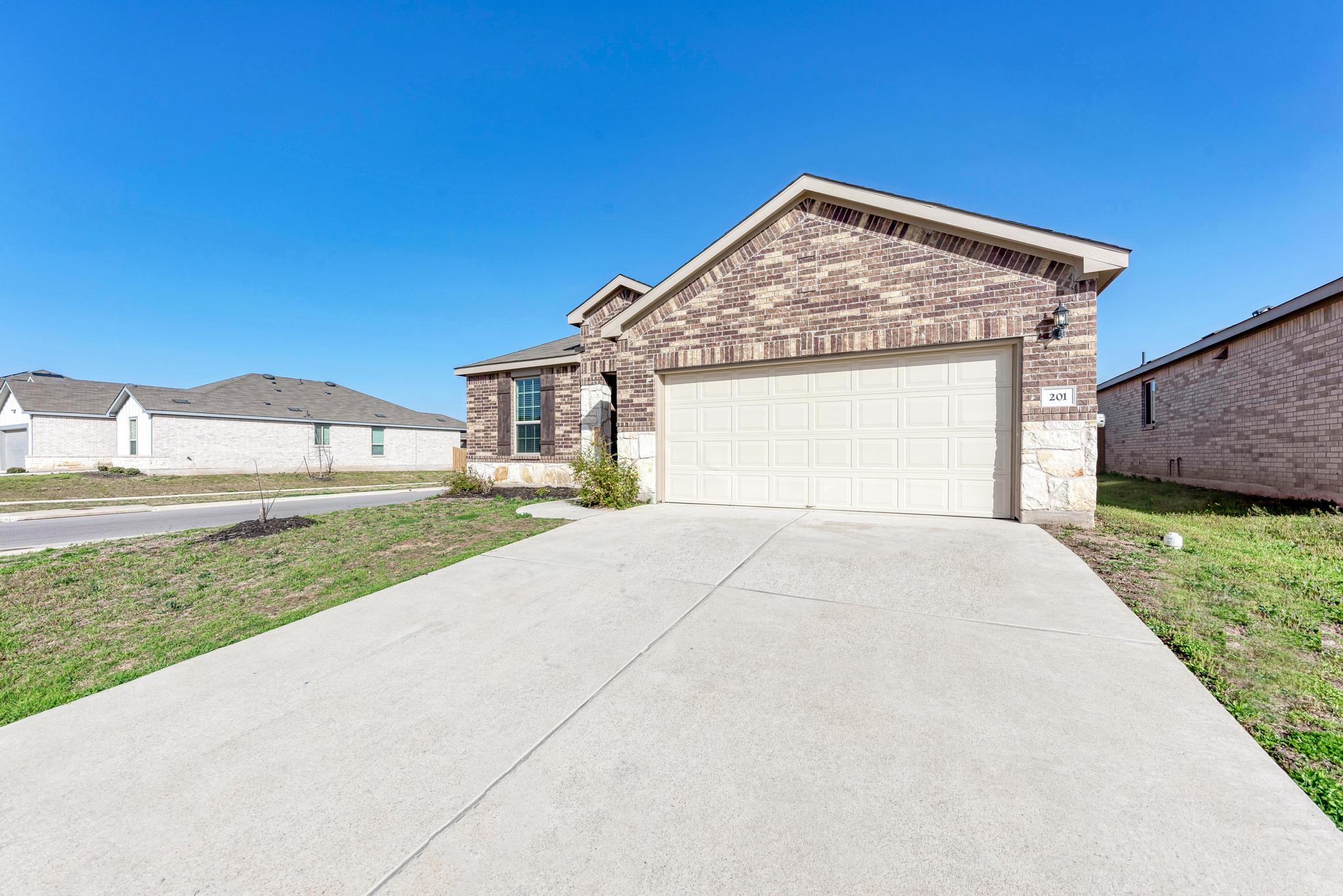 201 Pivot Drive Taylor, TX 76574 - Photo 2 of 34 a view of backyard of house with green space