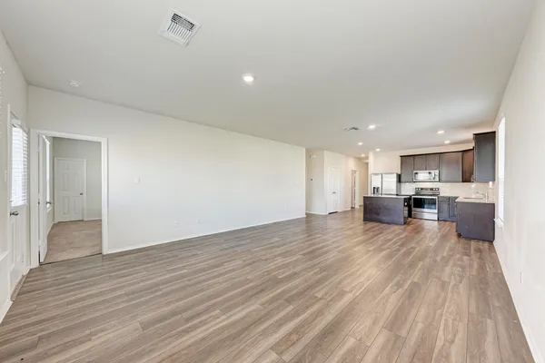 a view of kitchen with wooden floor