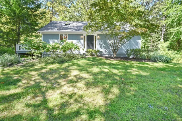 a house view with a garden space