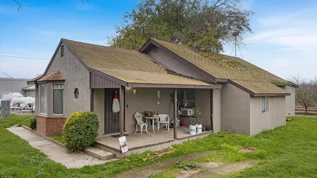 a view of a house with patio