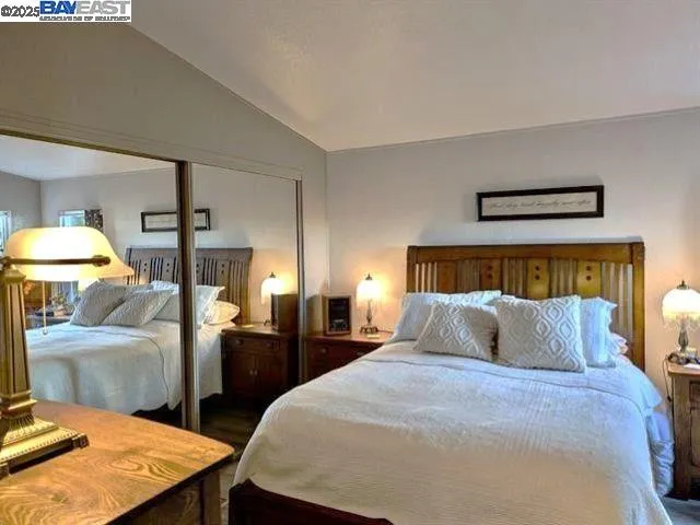 a room with a dresser and a window