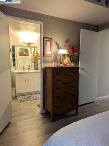 a bathroom with a sink double vanity and a mirror
