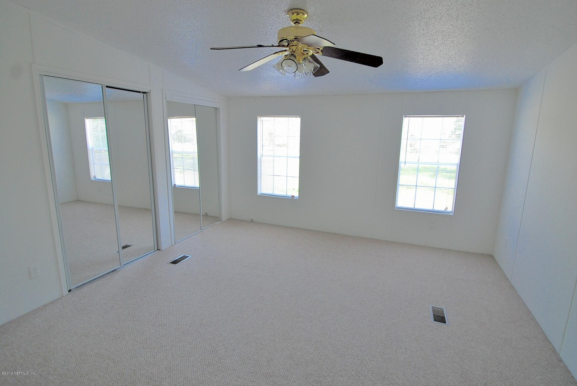 54525 Marlee Road Callahan, FL 32011 - Photo 7 of 22 a view of empty room with window