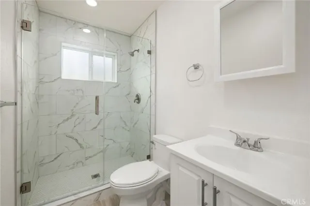 a utility room with washer and dryer