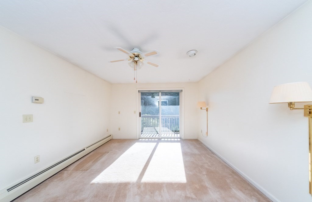 4 Jill Lane, Unit A Sterling, MA 01564 - Photo 19 of 38 wooden floor in an empty room with a window