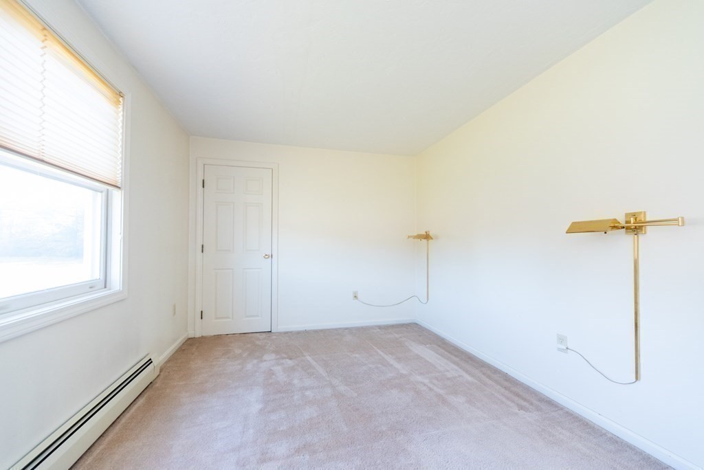 4 Jill Lane, Unit A Sterling, MA 01564 - Photo 25 of 38 an empty room with windows