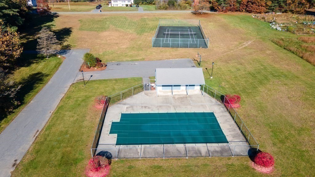 4 Jill Lane, Unit A Sterling, MA 01564 - Photo 31 of 38 a view of swimming pool with sitting area
