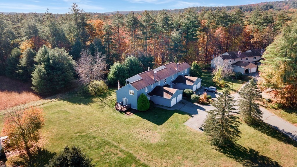 4 Jill Lane, Unit A Sterling, MA 01564 - Photo 34 of 38 an aerial view of a house with a yard