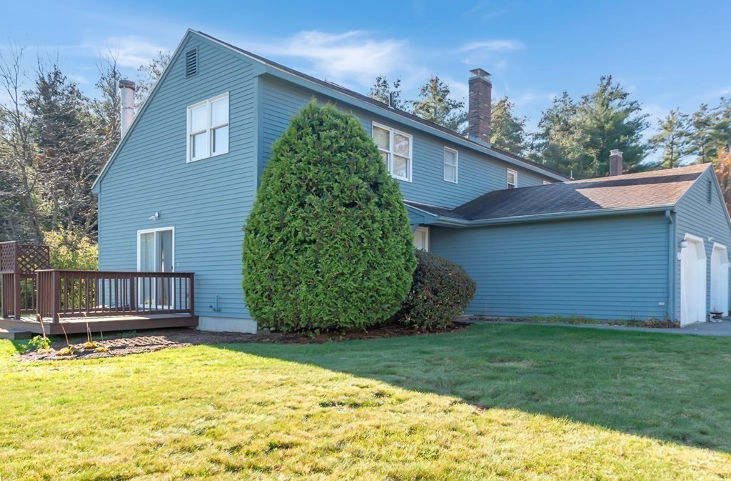 4 Jill Lane, Unit A Sterling, MA 01564 - Photo 5 of 38 a view of a backyard of the house
