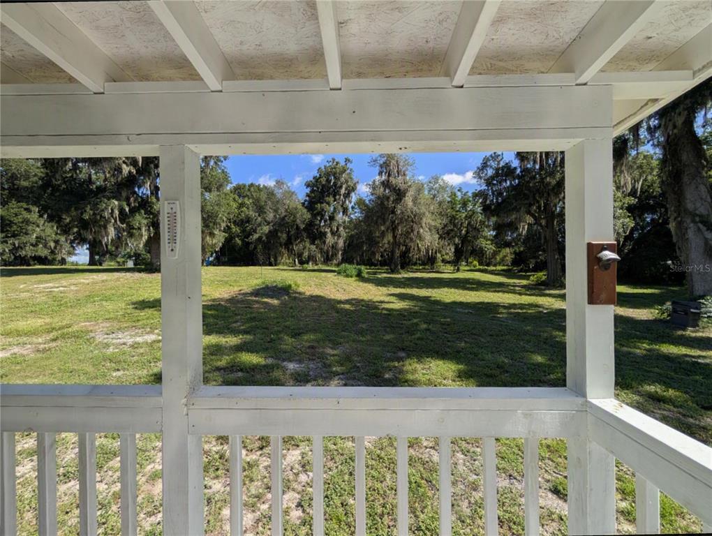 123 Amos Road Crescent City, FL 32112 - Photo 2 of 36 a front view of a house with a yard