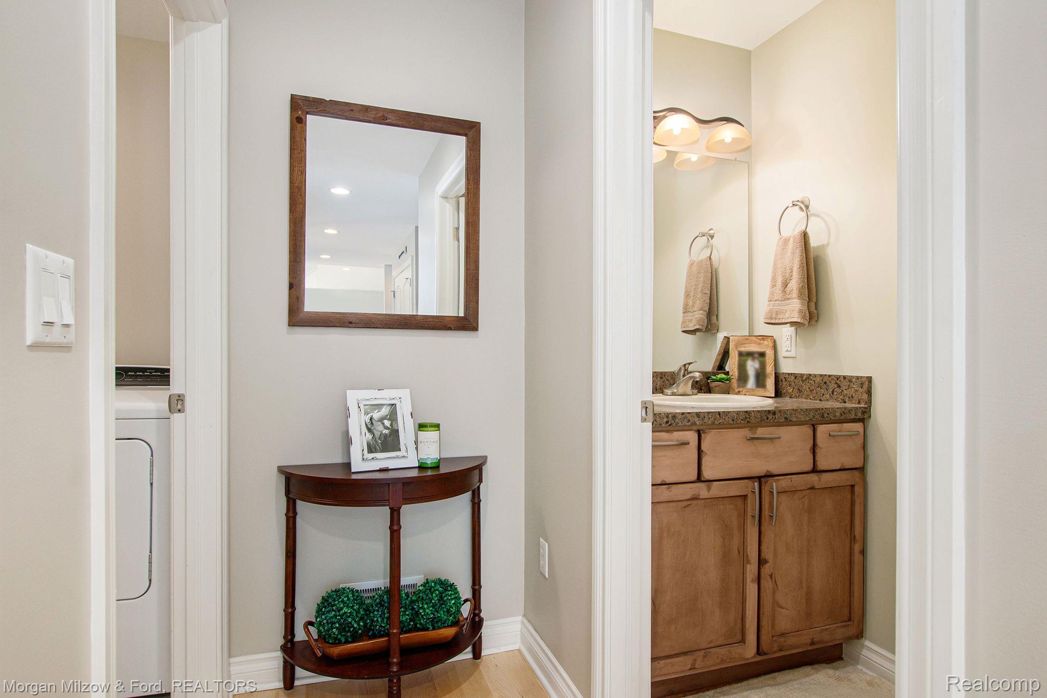 9647 Hadley Road Clarkston, MI 48348 - Photo 12 of 31 First floor powder bath and laundry room
