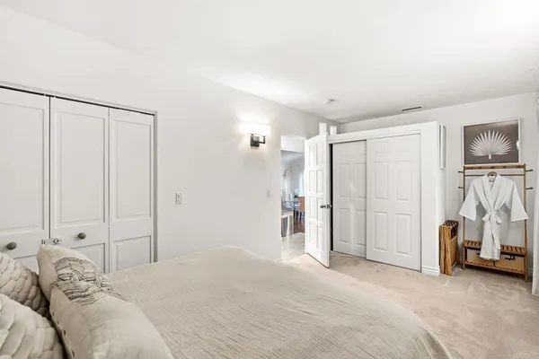 a bedroom with a bed and a view of en suite