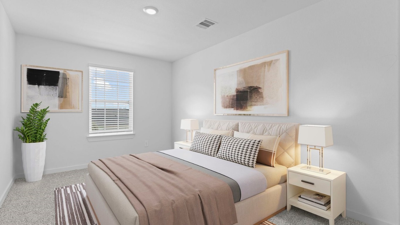 6324 Cherry Mdws Street Rosenberg, TX 77469 - Photo 20 of 41 a bedroom with a bed and a potted plant