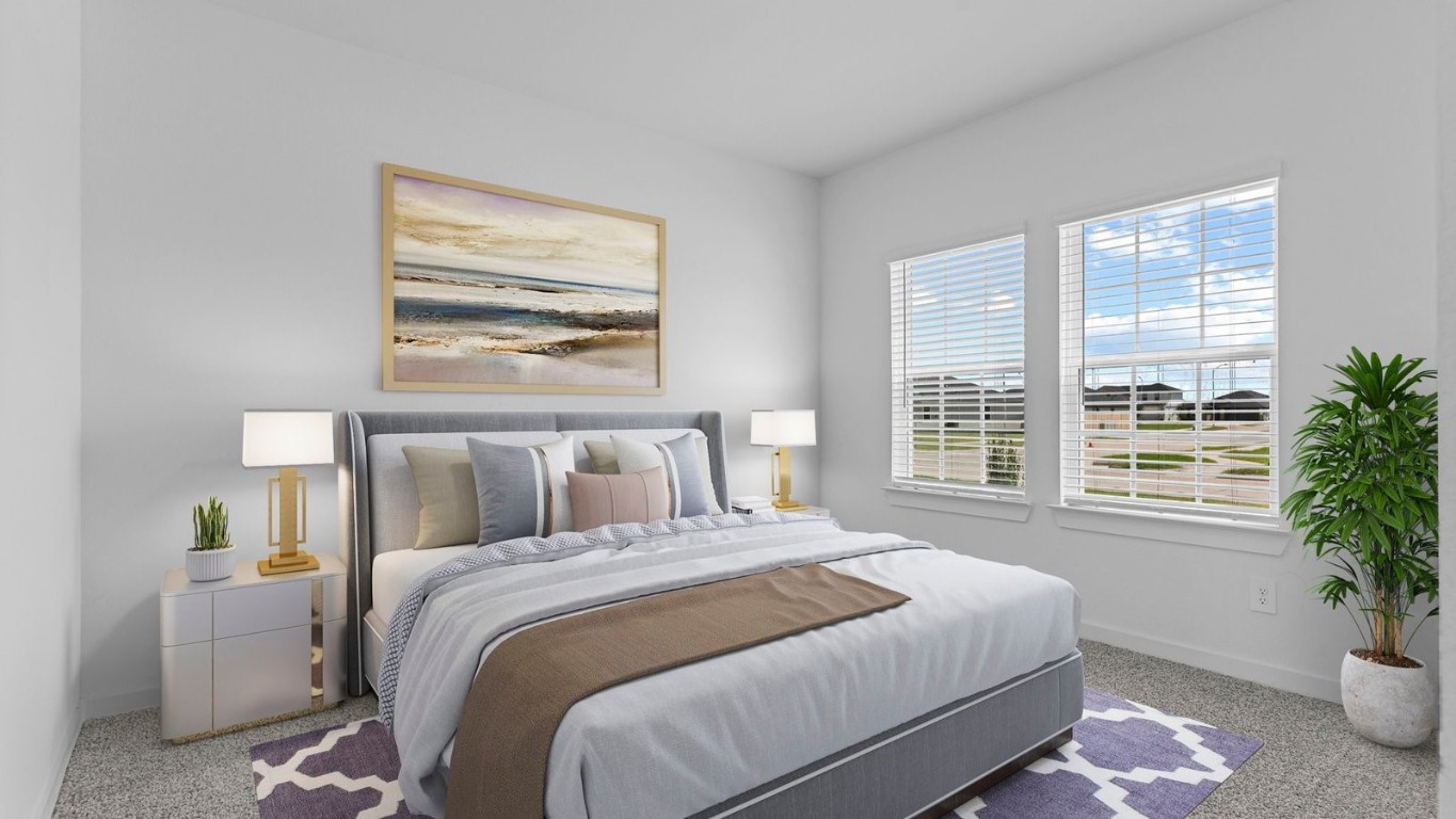 6324 Cherry Mdws Street Rosenberg, TX 77469 - Photo 24 of 41 a bedroom with a large bed and a potted plant