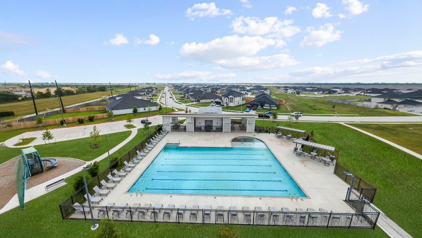 6324 Cherry Mdws Street Rosenberg, TX 77469 - Photo 37 of 41 a view of a swimming pool with a terrace