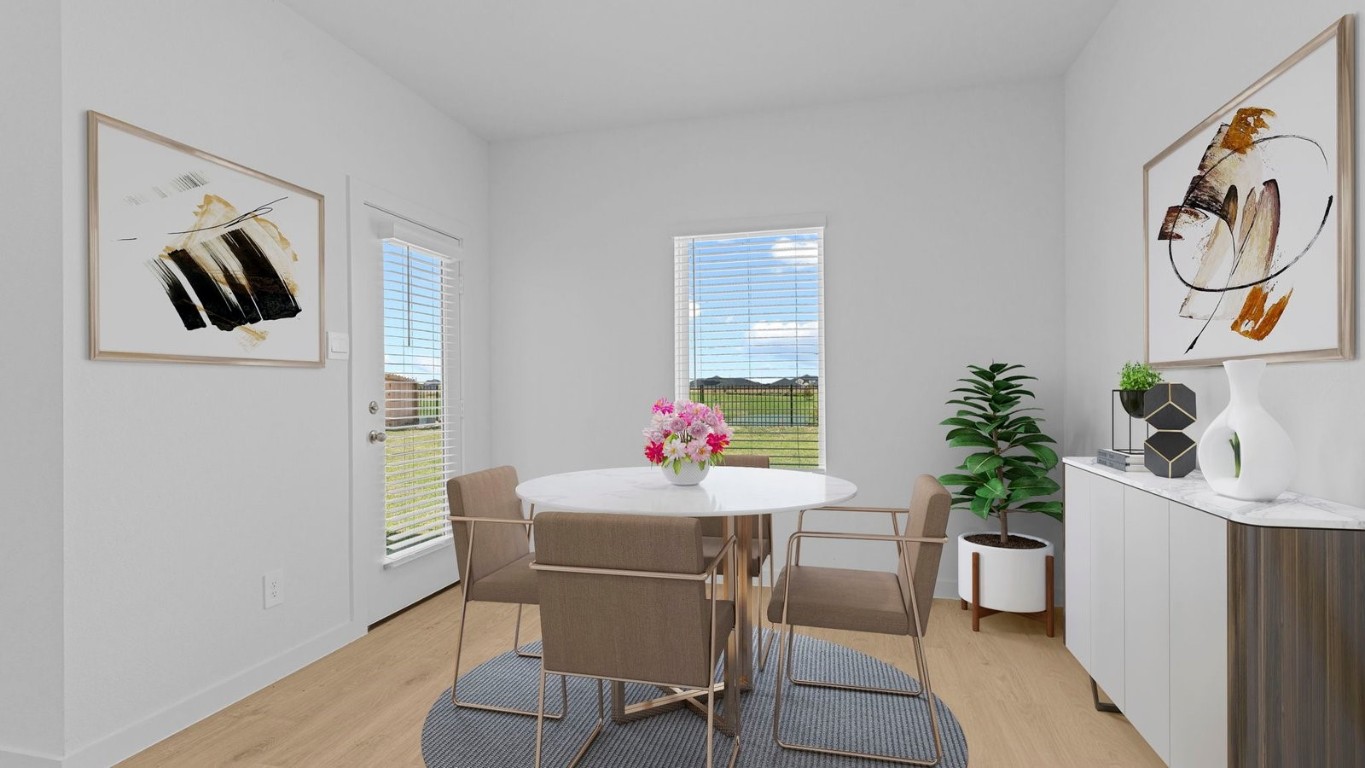 6324 Cherry Mdws Street Rosenberg, TX 77469 - Photo 10 of 41 a dining room with furniture and window