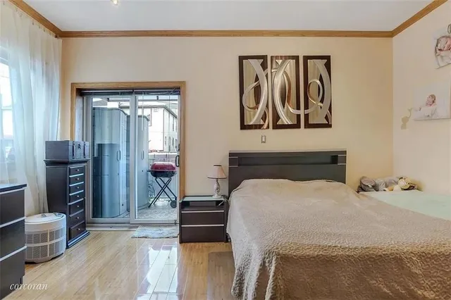 a bed room with a bed and dresser