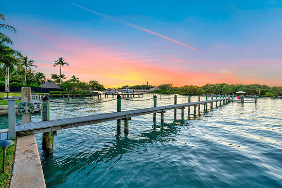 107 Lighthouse Drive Jupiter Inlet Colony, FL 33469 - Photo 3 of 11 a view of a lake and outdoor space