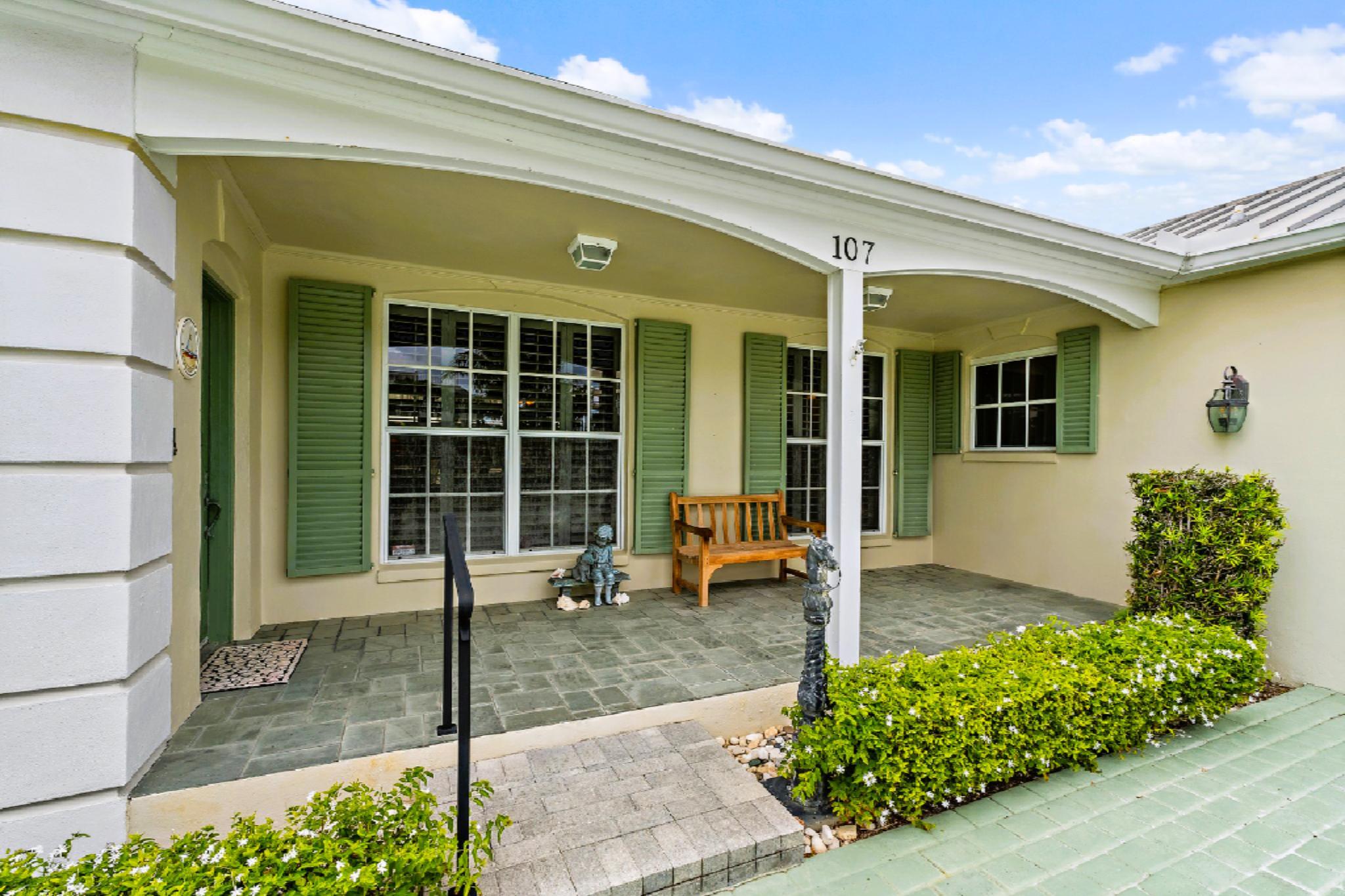 107 Lighthouse Drive Jupiter Inlet Colony, FL 33469 - Photo 7 of 11 a view of a house with outdoor space