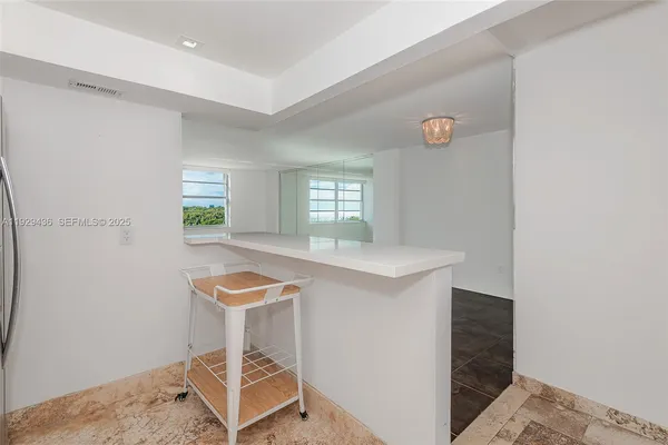 a room with furniture and window