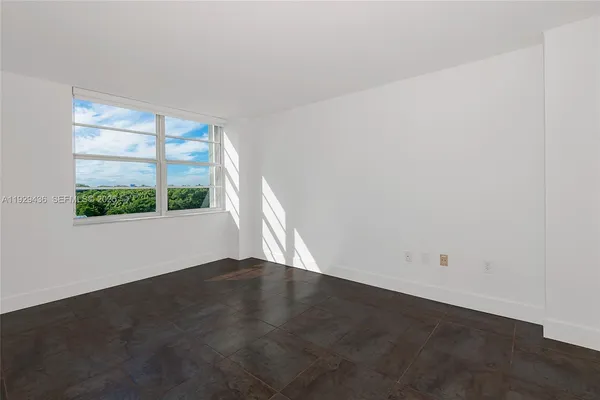 an empty room with a window